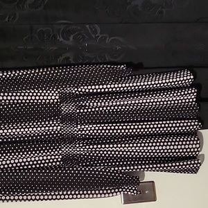 MK Blk/Wht LS 100% polester.  Machine  washable.  Mini dress with elastic waist